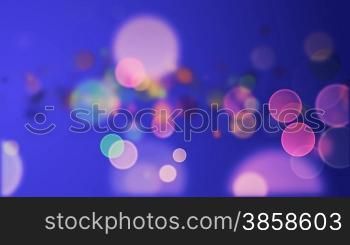 Colorful particles on blue background