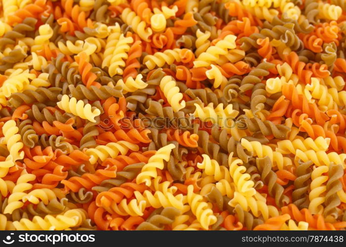 Colorful pasta as a background.