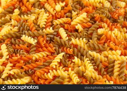 Colorful pasta as a background.