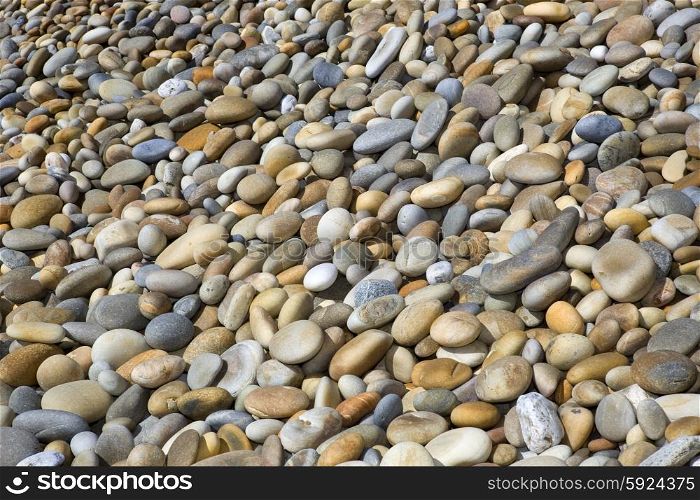 colorful pebble stone background, at the beach