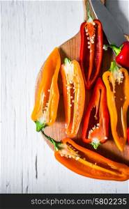 Colorful peppers on rustic background