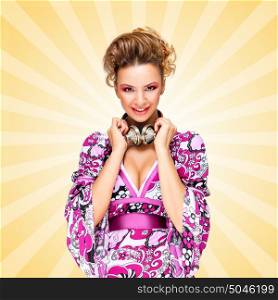 Colorful photo of a smiling fashionable hippie homemaker with metal vintage music headphones around her neck on colorful abstract cartoon style background.