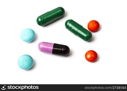 Colorful pills isolated on white background