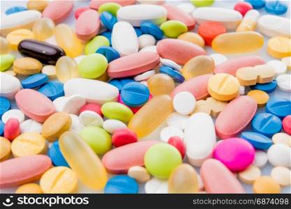 Colorful pills. Medical or vitamin pills. Colorful medicine pills as texture. Pill pattern background