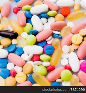 Colorful pills. Medical or vitamin pills. Colorful medicine pills as texture. Pill pattern background