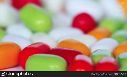 Colorful Pills Over White Background. Shot Slider.