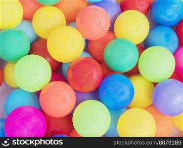 Colorful plastic toy balls background