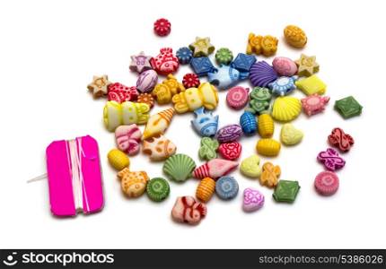 Colorful plastic toy beads isolated on white