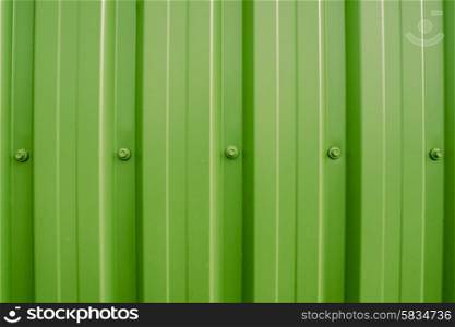 Colorful plastic wall with iron nuts