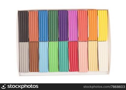 Colorful plasticine in box isolated on white