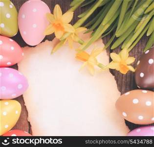 Colorful polka dot eggs and empty greeting card. Easter decorations