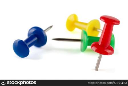 Colorful push pins isolated on white