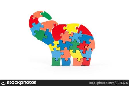 Colorful puzzle pieces in elephant shape - isolated over white