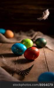 colorful rainbow Easter eggs on a wooden background. Easter. colorful rainbow Easter eggs on a wooden background
