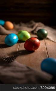 colorful rainbow Easter eggs on a wooden background. Easter. colorful rainbow Easter eggs on a wooden background