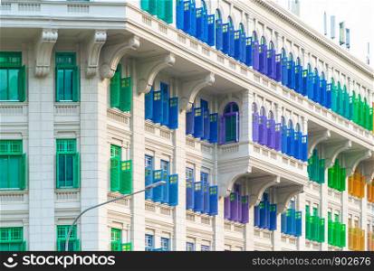 Colorful rainbow pastel building with facade windows background. Architecture building design in Former Hill Street Police Station near Clarke Quay, Singapore City.