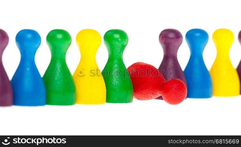 Colorful row of pawns on a white background, red pawn fallen
