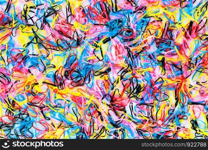Colorful rubber band laid on a white background