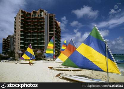 Colorful sailboats on a beach at Crystal Palace Hotel, Nassau, Bahamas