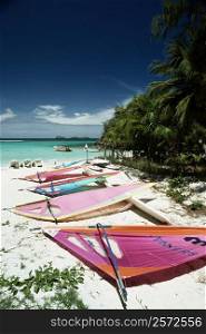 Colorful sails lying on a serene beach, St. Bant&acute;s