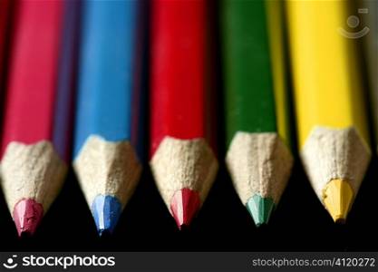 Colorful set of pen in vibrant colors over black