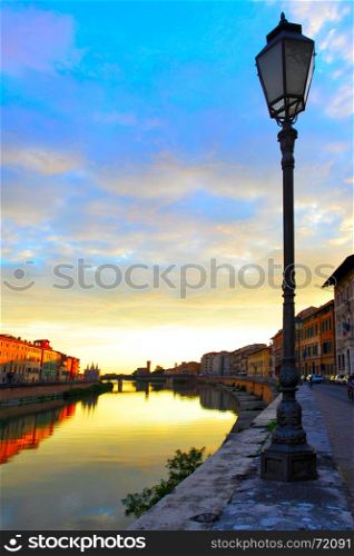 Colorful sky at sundown in Pisa, Italy