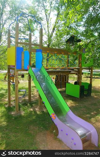 colorful slide children park outdoor nature trees