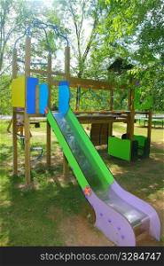 colorful slide children park outdoor nature trees