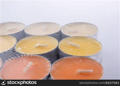 Colorful small Candles on a white background