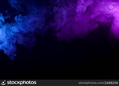 Colorful smoke or fog mist blue and purple border on black background