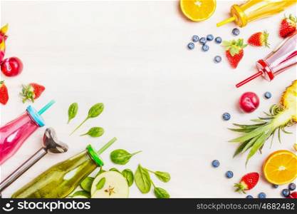 Colorful smoothies : green, pink, yellow and red with ingredients for Healthy eating , detox or diet food concept on White wooden background, Top view, frame