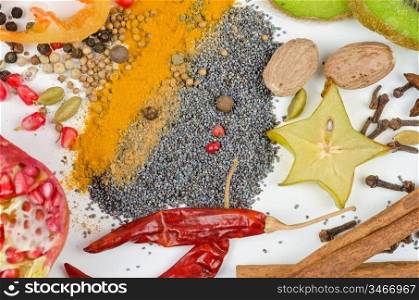 Colorful spices on a white background - beautiful kitchen image.