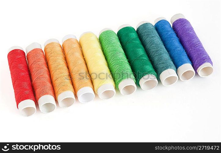 colorful spools threads
