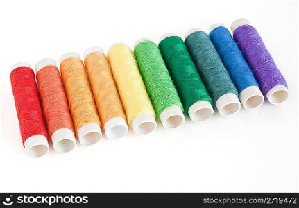 colorful spools threads