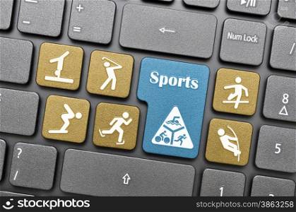 Colorful sports concept key on keyboard