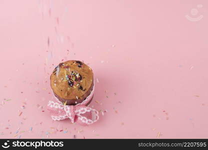 colorful sprinkles falling easter cake