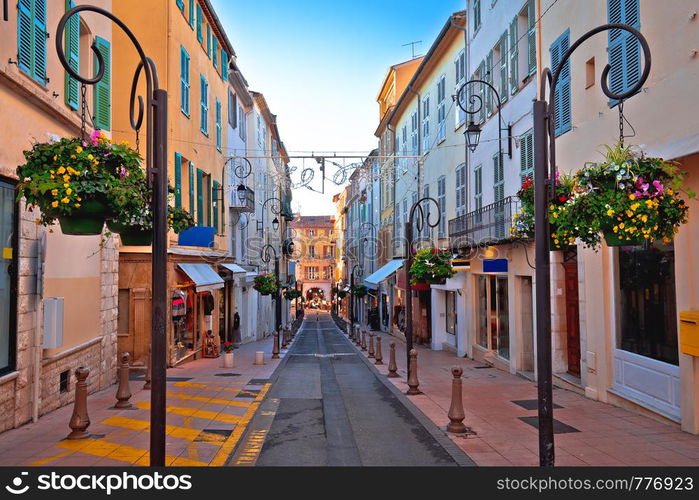 Colorful street in Antibes walkway and shops view, Southern France