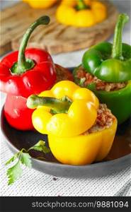 Colorful stuffed peppers with rice and minced meat. Stuffed paprika with rice and chopped meat