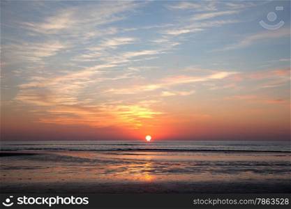 colorful sundown above the North Sea on the North Sea coast of the netherlands