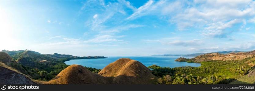 Colorful sunny day panorama at Amelia sunset point, Labuan Bajo, Flores Island, Indonesia.. Colorful sunny day panorama at Amelia sunset point.