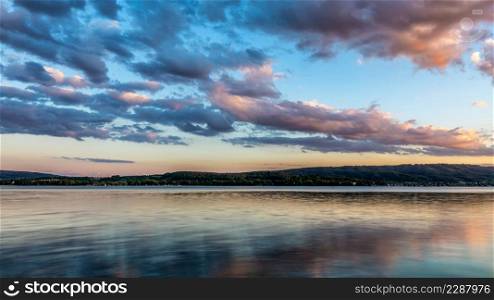 Colorful sunset on Lake Constance with colorful clouds