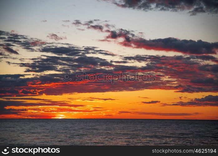 colorful sunset over the evening ocean. sunset over the evening ocean