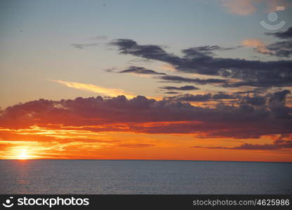 colorful sunset over the evening ocean. sunset over the evening ocean