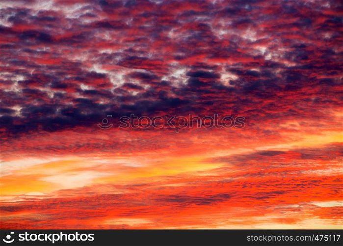 Colorful sunset sky over tranquil sea surface
