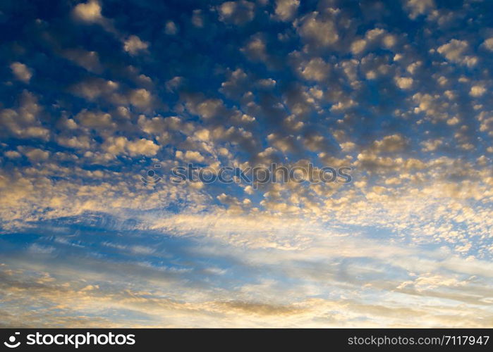 Colorful sunset sky over tranquil sea surface