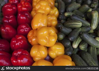 Colorful sweet bell peppers, at the market natural background.