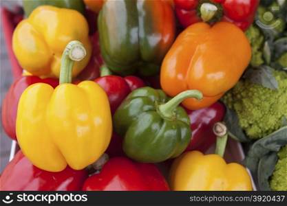 Colorful sweet bell peppers, at the market natural background.