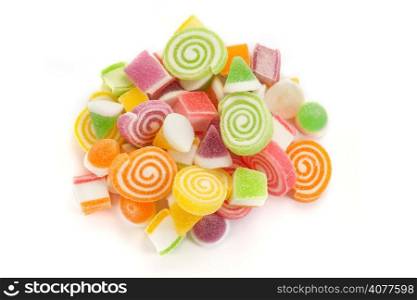 Colorful sweet candies on white background