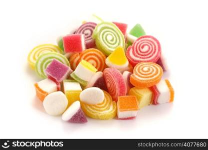 Colorful sweet candies on white background