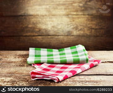colorful tablecloth on old wooden table